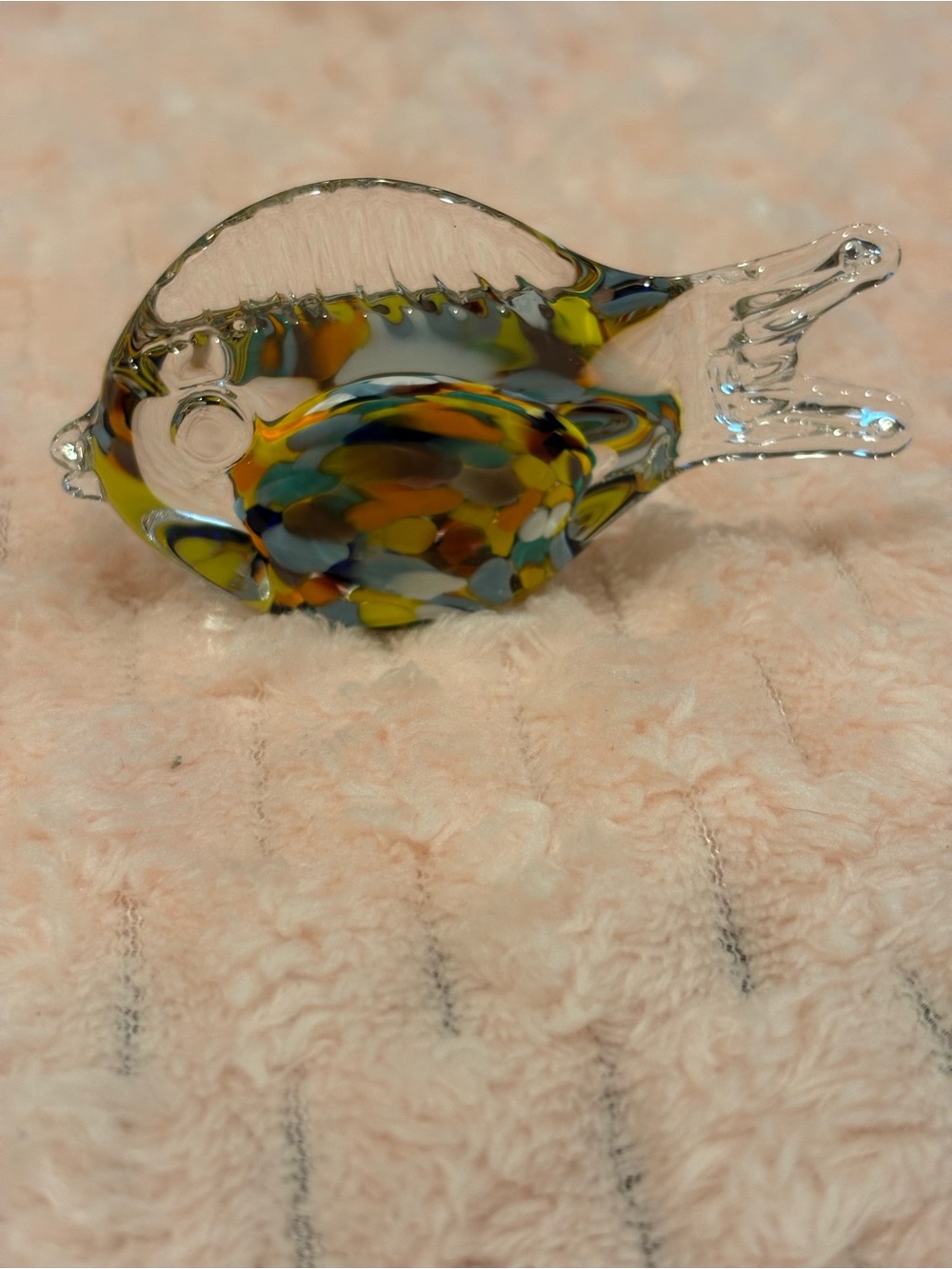 Colorful art, glass fish figurine.